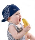 Child keeps banana