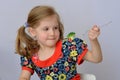 Child, kid, baby little girl  doesn`t want to eat broccoli. Royalty Free Stock Photo