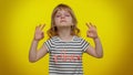 Child kid girl breathes deeply with mudra gesture, eyes closed, meditating, keep calm down, relax