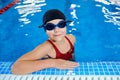 Child kid girl swimmer in the pool