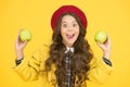 Child kid happy face hold apples. Healthy food concept. Apples vitamin snack. Girl cute long curly hair hold apples