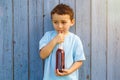 Child kid little boy drinking cola lemonade drink copyspace copy