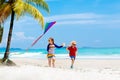 Child with kite. Kids play. Family beach vacation. Royalty Free Stock Photo