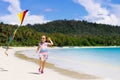 Child with kite. Kids play. Family beach vacation Royalty Free Stock Photo