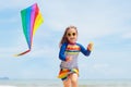 Child with kite. Kids play. Family beach vacation Royalty Free Stock Photo