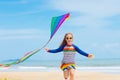 Child with kite. Kids play. Family beach vacation Royalty Free Stock Photo