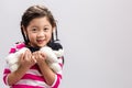 Child with Kitten Doll Background / Child with Kitten Doll / Chi Royalty Free Stock Photo