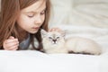 Child and kitten