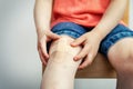 Child knee with adhesive medical plaster strip bandage Royalty Free Stock Photo