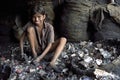 Child labor in recycling of batteries, Bangladesh Royalty Free Stock Photo