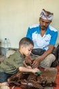 Child labor at Sari Pertiwi Wood Carving business, Juga, Bali, Indonesia