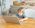 child laptop computer technology home boy son man education homework kid learning internet childhood student sitting Royalty Free Stock Photo