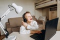 Child laugh home school quarantine online technology Royalty Free Stock Photo