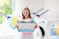 Child in laundry room with washing machine Royalty Free Stock Photo