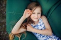 A child lays on a resting on an air sofa in the forest. Lamzac. Travel, family vacation in the forest in summer Royalty Free Stock Photo