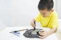 A child learning Chinese Calligraphy Royalty Free Stock Photo