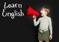 Child learning English language and screaming through a megaphone Learn English