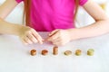 Child learning how to count money