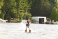 Child learning to water skiing on a lake Royalty Free Stock Photo