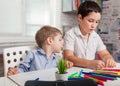 The child learns at home. Happy children draw in the classroom. Royalty Free Stock Photo