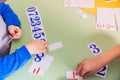 The child learns to count by adding numbers