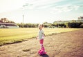 Child learns to roller skate. Roller skating Royalty Free Stock Photo