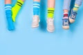 Child legs in mismatched socks