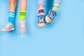 Child legs in mismatched socks