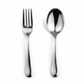Child-like Innocence: Metal Flatware Set With Spoon And Fork Royalty Free Stock Photo
