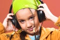 Child listening music in headphones Royalty Free Stock Photo