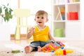 Child little boy plays a musical instrument xylophone Royalty Free Stock Photo