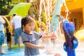 Child little girl having fun to play with water Royalty Free Stock Photo