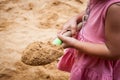 Child little girl holding sand shovel