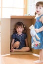 Child little girl inside box Royalty Free Stock Photo