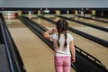 Child little girl playing bowling Royalty Free Stock Photo