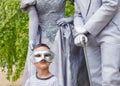 Child with living statues Royalty Free Stock Photo