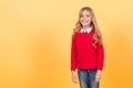 Child with long blond hair happy smile in red sweater Royalty Free Stock Photo