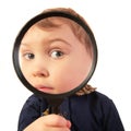 Child look through magnifier