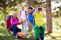 Child looking through binocular