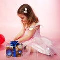 Child looking on Christmas gifts