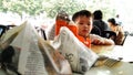 Child looking at Nasi Lemak Food in Malaysia