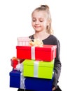 Child with a lot of gift boxes in hands on isolated background Royalty Free Stock Photo