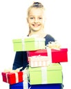 Child with a lot of gift boxes in hands on isolated background Royalty Free Stock Photo