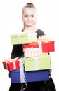 Child with a lot of gift boxes in hands on isolated background Royalty Free Stock Photo