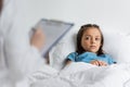 Child lying on clinic bed near Royalty Free Stock Photo