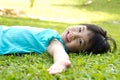 Child lying on grass Royalty Free Stock Photo