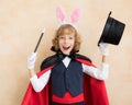 Child magician wearing rabbit ears Royalty Free Stock Photo