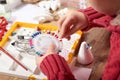 Child make crafts and toys, handmade concept. Artwork workplace with creative accessories. Royalty Free Stock Photo