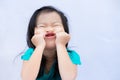 Child make funny faces. Kids puts his hands  feet and chin and does freaky face. Cute baby good mood. Royalty Free Stock Photo