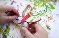 Child making a buttlerfly with recycled materials and EVA foam